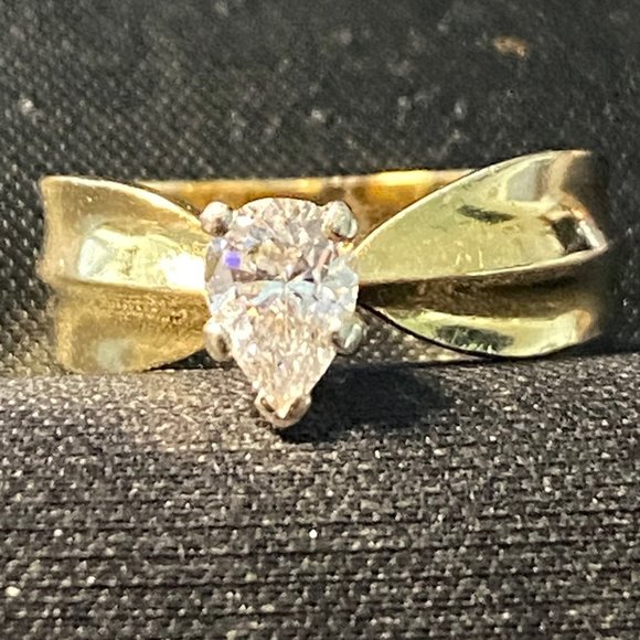 14kt, .62ctw PEAR SHAPED DIAMOND RING
